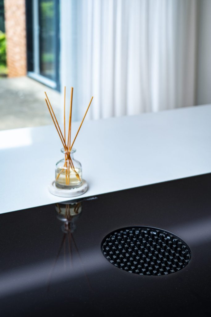 Stone bench tops with integrated induction cooktop