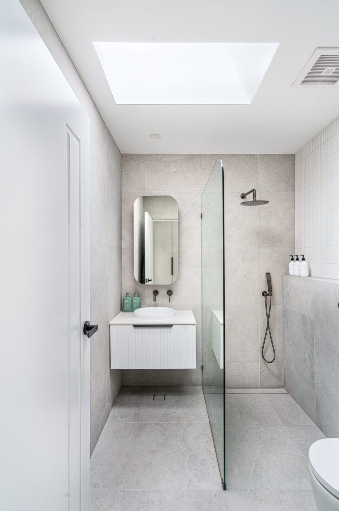 Completed bathroom renovation combining functionality with contemporary design