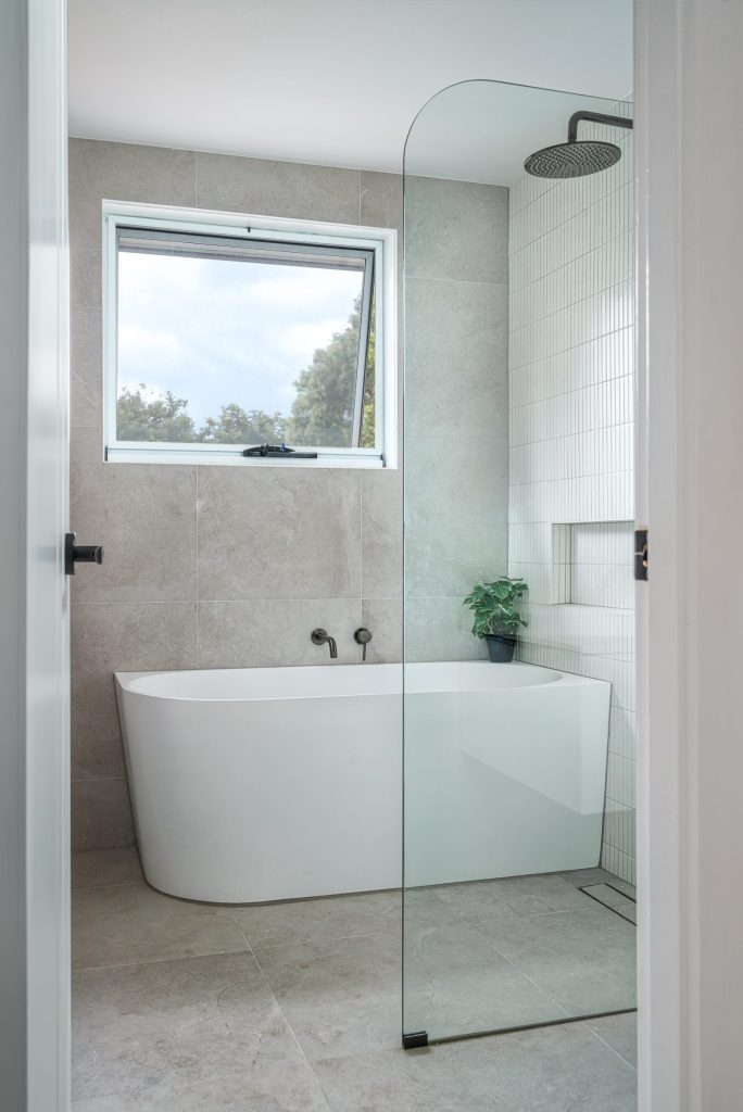 Family bathroom designed for practicality, comfort and timeless style