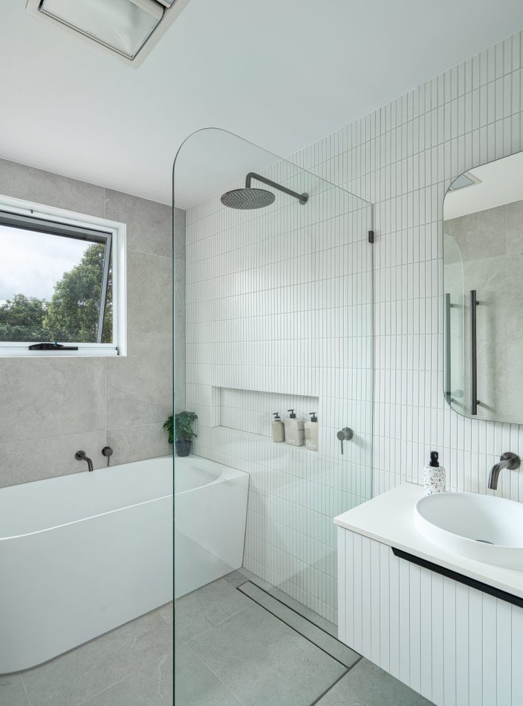 Family bathroom designed for practicality, comfort and timeless style