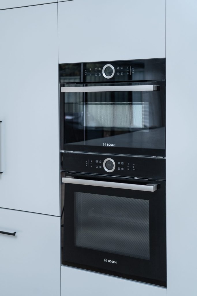 Contemporary kitchen with integrated appliances and clean lines