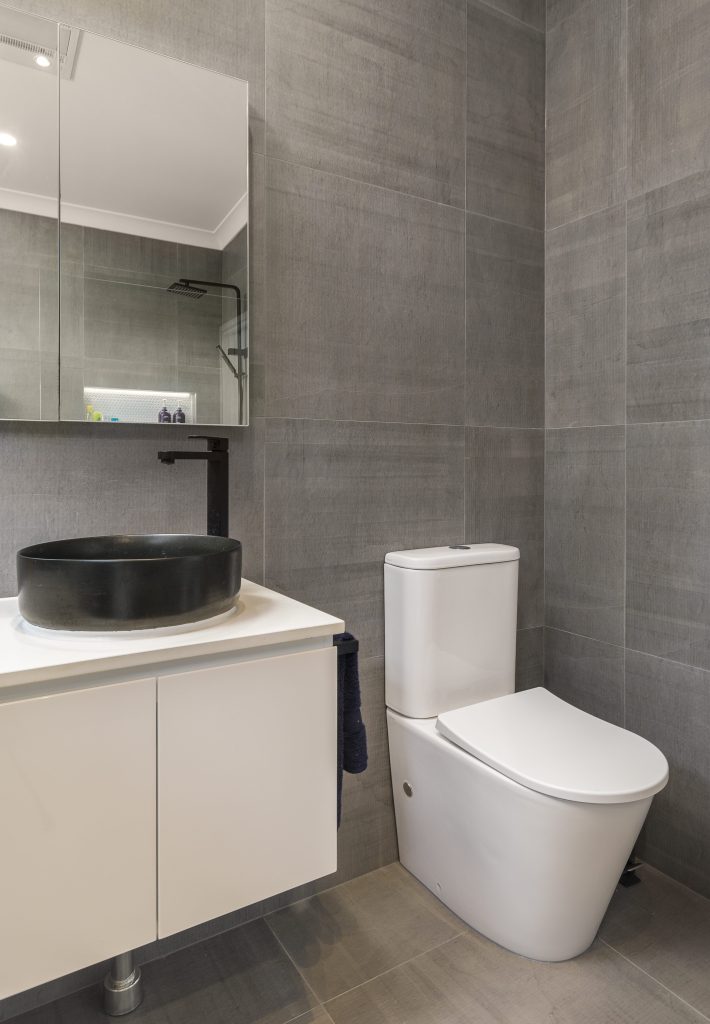 Wall mounted vanity with mirrored shaving cabinets