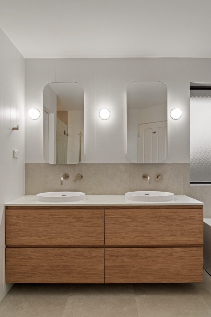 Minimalist bathroom with soft neutral finishes and modern fixtures kellyville