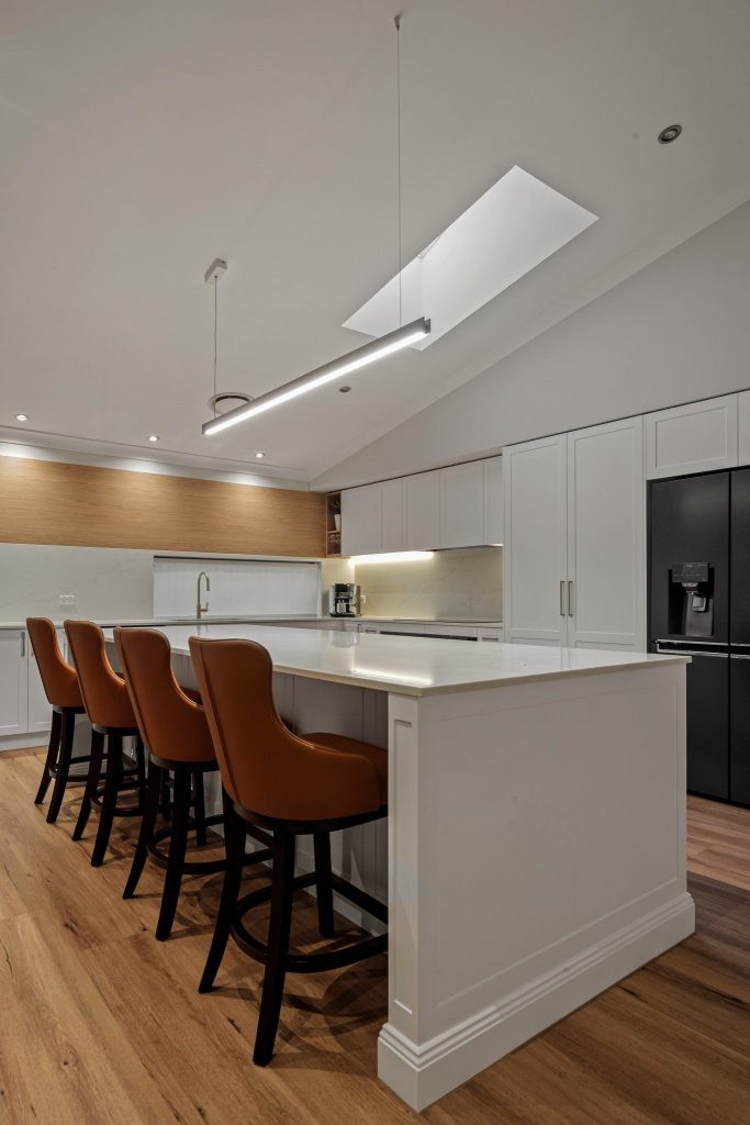 Contemporary kitchen with integrated appliances and clean lines