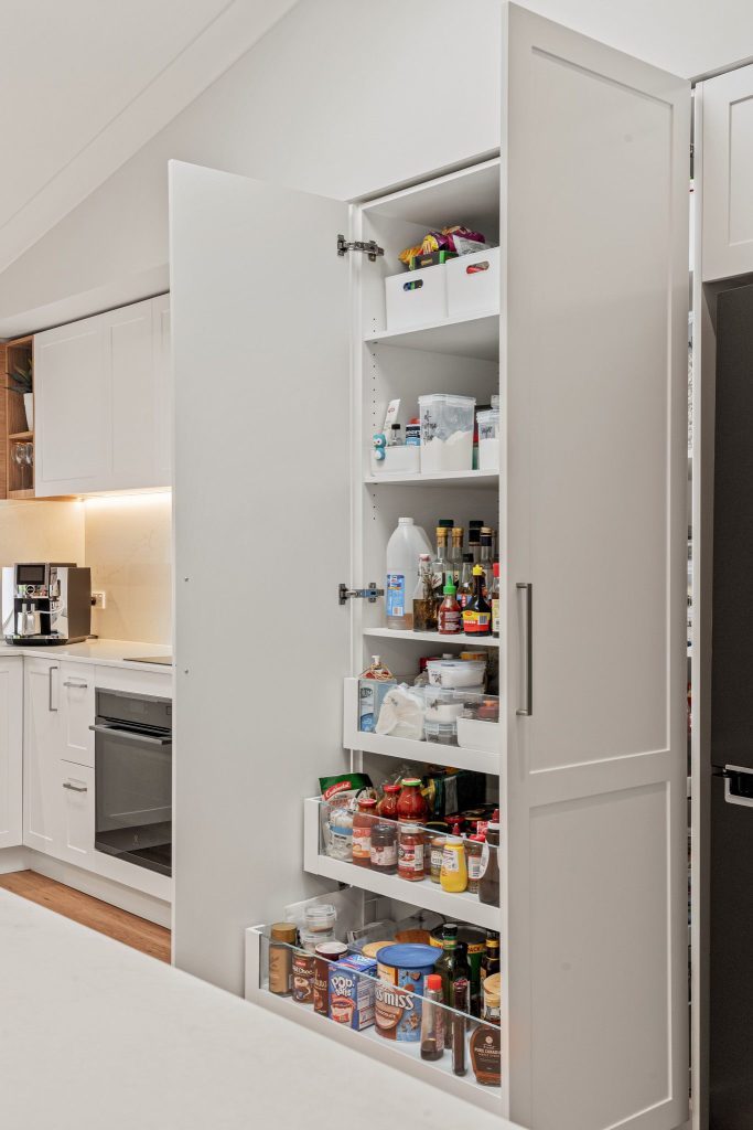 Soft-close custom cabinetry with premium hardware and storage solutions