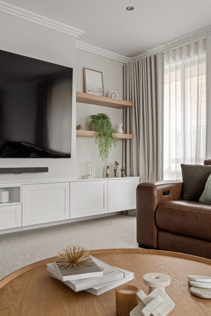 Built-in entertainment unit with bespoke timber joinery