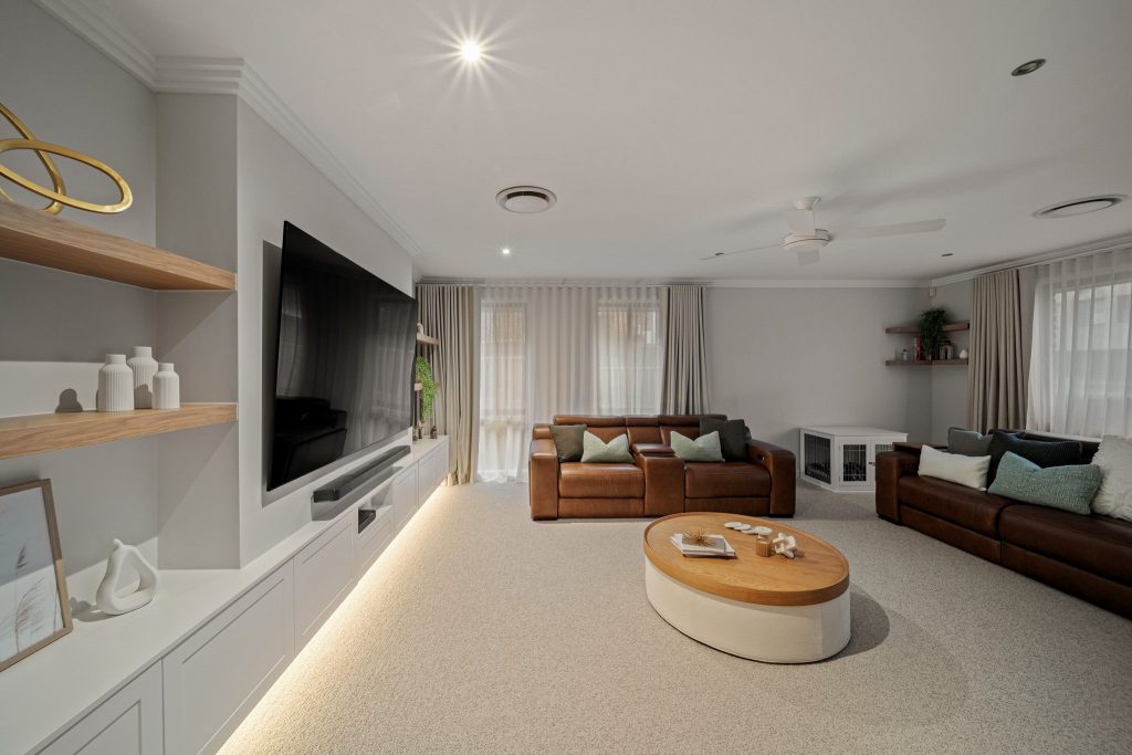 Built-in entertainment unit with bespoke timber joinery