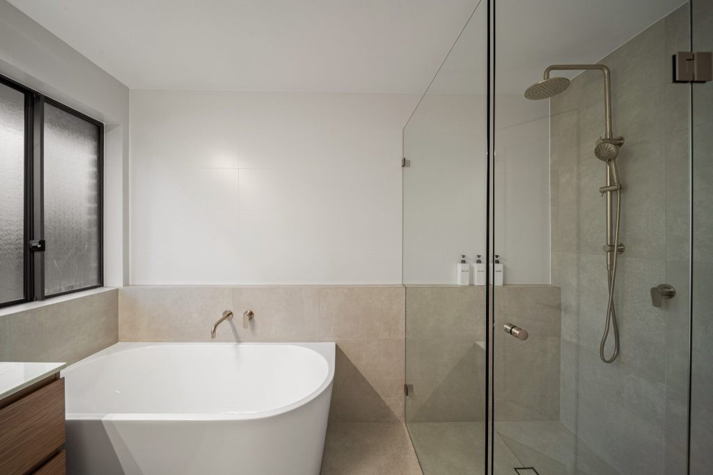 Elegant family bathroom designed with neutral tones and quality finishes