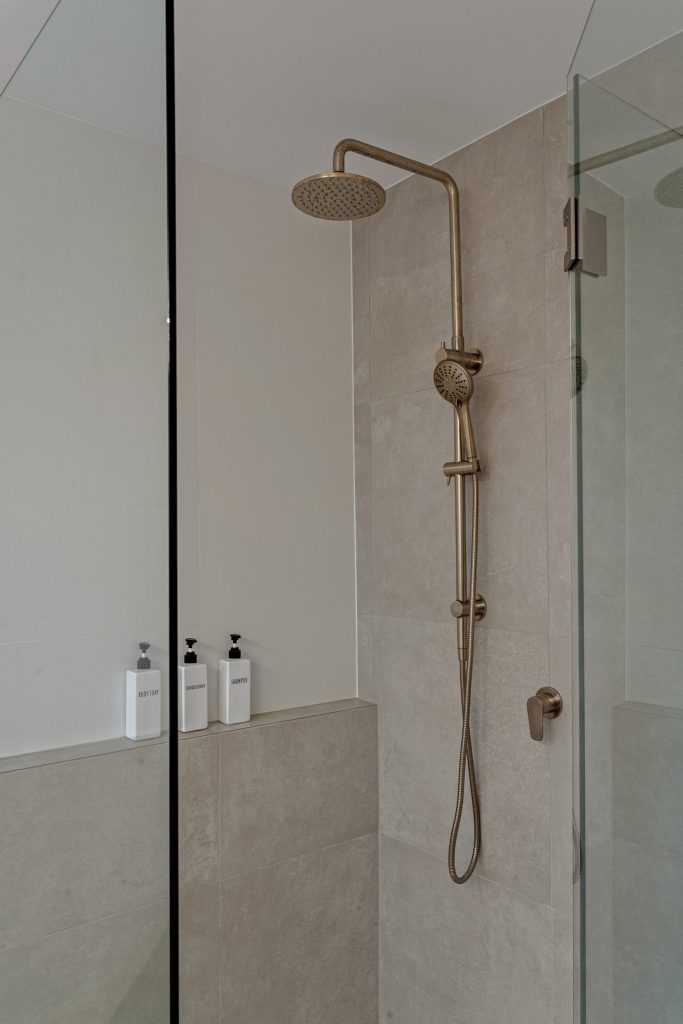 Elegant family bathroom designed with neutral tones and quality finishes