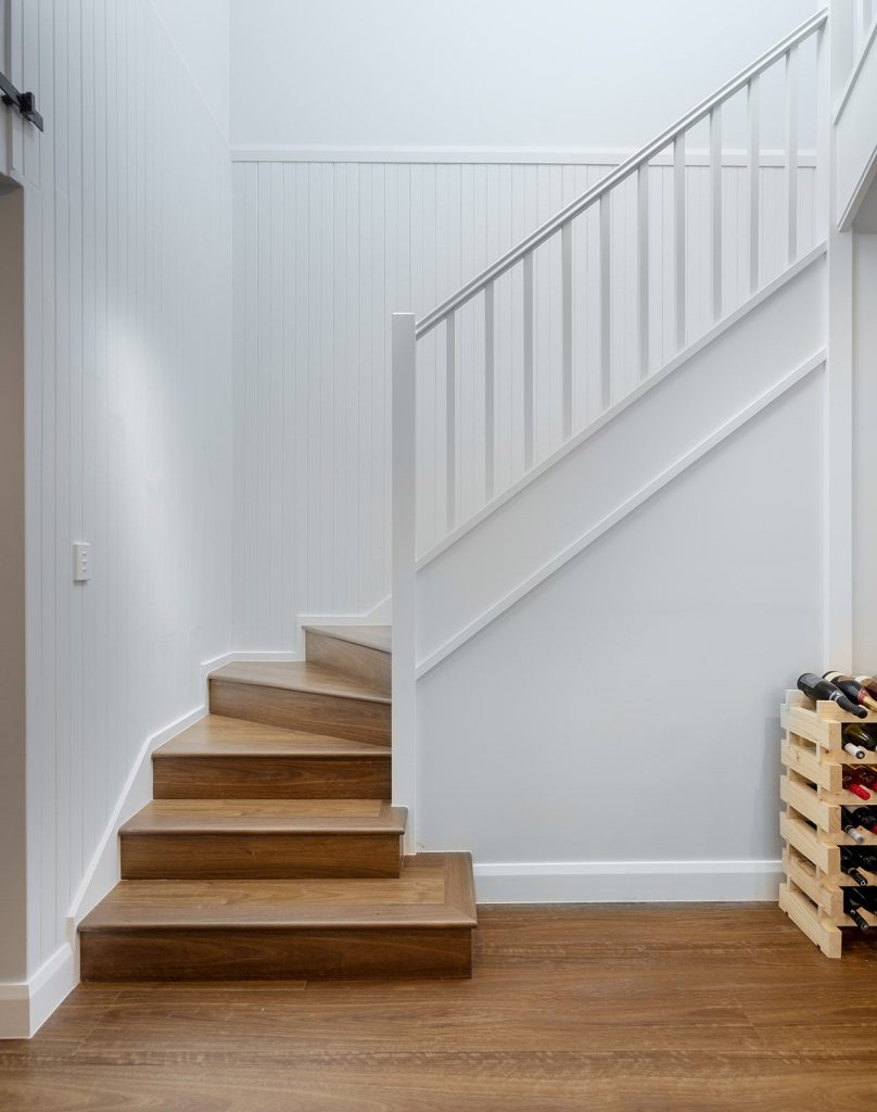 Seamlessly integrated staircase to the First story addition built by iBuild Group