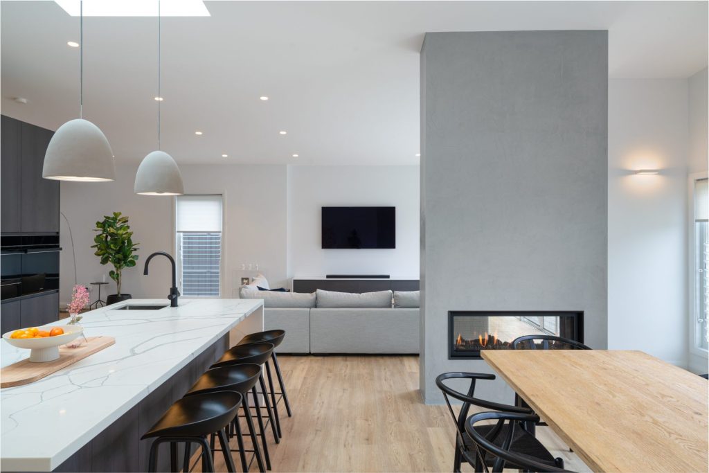 Custom-built kitchen with quality cabinetry, feature lighting and stone surfaces