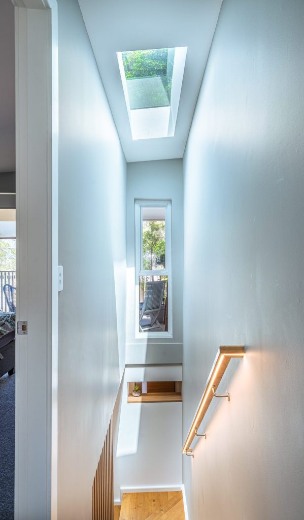 Bright stairwell featuring skylights throughout to bring in the natural light
